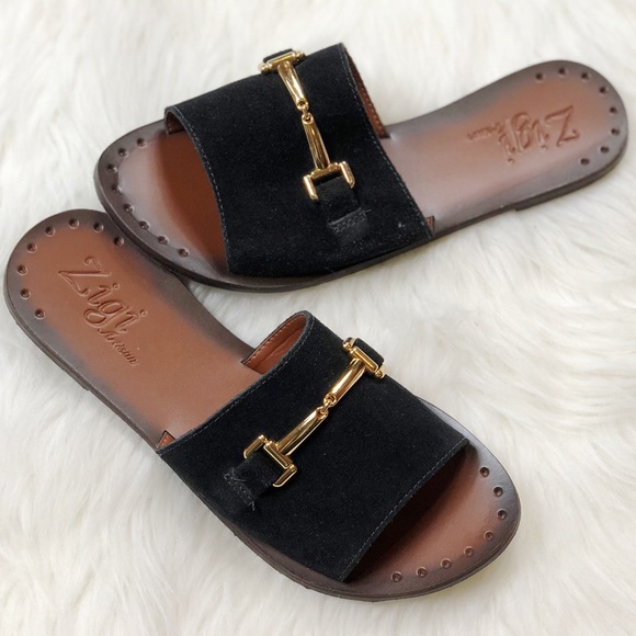 black sandals with gold buckle